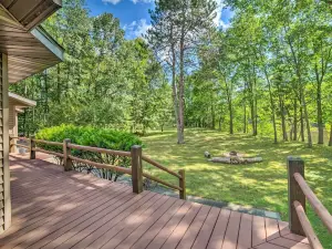 Riverfront Oconto Cabin with Fire Pit and Yard!