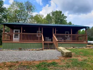 The Bear Den Cabin with pond view.
