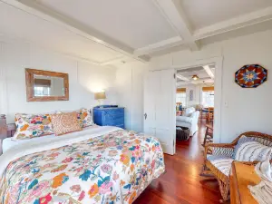 Lakefront home with private dock, kayaks, firepit, grill, & sunroom
