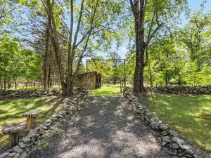 Enchanted Retreat w/ Cedar Hot Tub, Arcade Room, 7 Acre Private Woods & Fire Pit