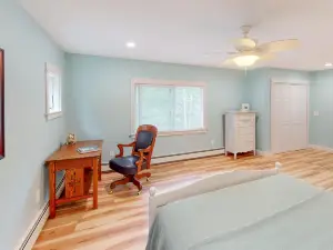 Waterfront home with hot tub, deck, patio, grill, firepit, Ping-Pong, & WiFi
