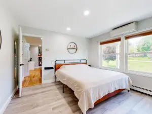 Relaxing two-story home with a deck, firepit, game room, & washer/dryer