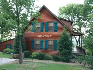 Family friendly log home has great lake views from huge deck!