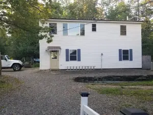 Year-round garage apartment on Lake Wassookeag with full amenities.