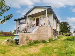 Walk to Bayou Home with Patio in Delacroix!