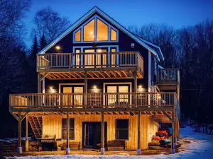 Experience Lakeside Living with a Perfect Blend of Rustic Charm & Modern Luxury