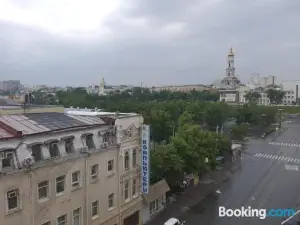 Apartment Dynasty, center, with a view of Kharkiv