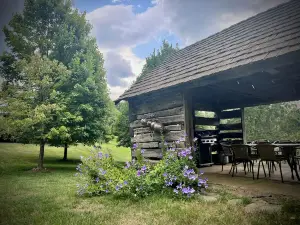 Modern farmhouse located on 53 acres of manicured rolling hills.