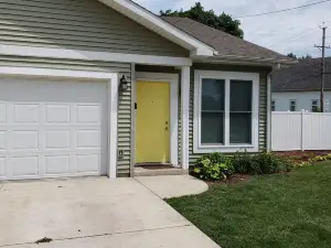 Newer 2 bedroom 1 bath with attached garage and free washer/dryer in a great loc