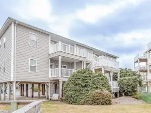 Lovely condo in oceanside complex with creek views, pool, free WiFi, AC, & W/D