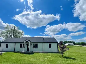Eagles Crossing is a Newly Renovated 3-Bed Farmhouse with a Large Deck & Hot Tub