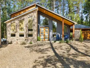 Hot Tub, Game Loft, and Cozy Patio - Stylish Bungalow Retreat