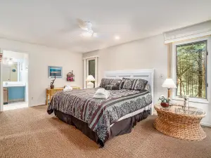 Two-story home with a patio, sunroom, balcony, & washer/dryer access
