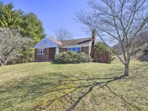 Quaint Creekside Home w/ Spacious Deck & Yard