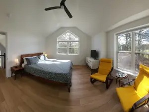 Secluded waterfront getaway with hot tub,fire pit, and private dock.