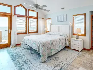Waterfront home w/ private hot tub, sunset views, WiFi, W/D, & shared pool