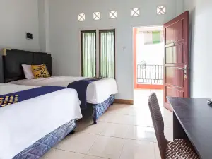 Spot on 93430 Delta Bnb Residence Syariah