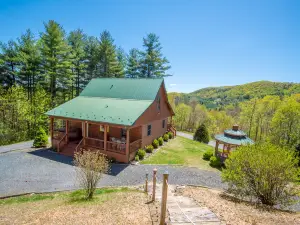 Privacy and Mountain Views Surround This Cozy Log Cabin