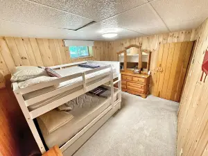 Lakeside Bliss Tait Lake – Cozy 3 Bed Cottage with Hot Tub & Private Waterfront!