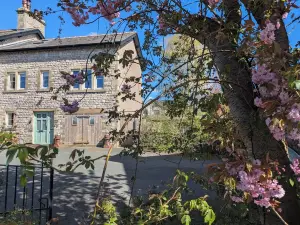 Cosy yet spacious property with private parking, close to the village centre.