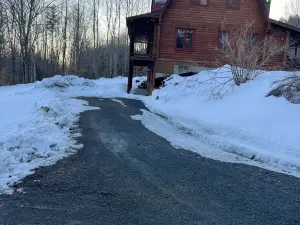 Log  cabin on Macintosh Pond access to VAST trail system snowmobile trails.