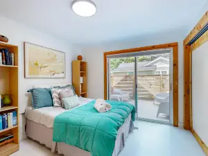 Dog-friendly downtown retreat with 2 kitchens & large fenced yards