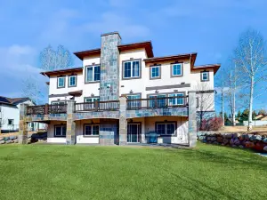 Luxe home on Gypsum Creek Golf Course with home theater, gym & 2 fireplaces