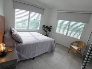 Steps from Black Sand Beach 3-Bedroom House in Delightful Maunabo with AC, WiFi