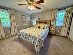 The Big Blue House – Spacious Bryan Retreat w/Game Room & Dog-Friendly Yard