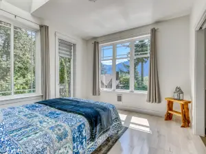 Lovely house with river & mountain views, deck, grill, washer/dryer & wood stove