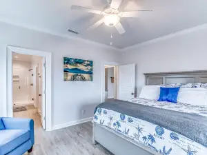 Dog-friendly, waterfront getaway w/ a private hot tub, furnished patio, hammock