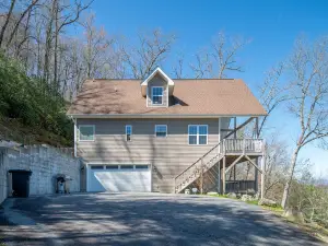 Cozy Living Area and Expansive Decks - Stunning Mountain Haven