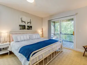 Lakefront home with private hot tub, dock, 2 decks & fireplace