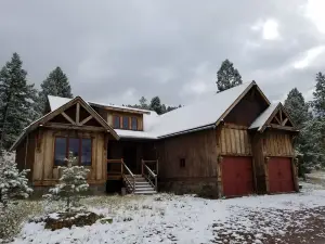 Secluded mountain lake and snow skiing getaway.