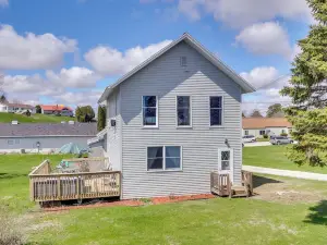 Walk to Beach Home with Game Room and Yard in Algoma!