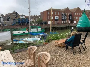 Cosy Sailing Boat Glamping Accommodation on the River in Sandwich