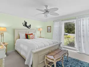 Gorgeous waterfront home with private hot tub, pool, views, deck, & fireplace