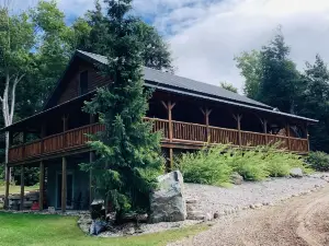 Log Home Located on Lake Muskallonge