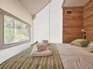 Comfortable tent lodge with veranda