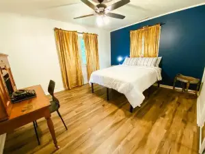 Spacious home in downtown Parsons! Conference room, HS internet, & private yard
