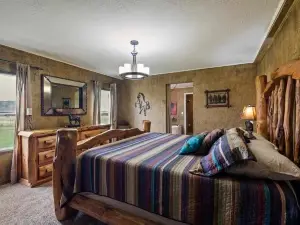 Mountain views, wrap around porch, incredible lawn with fire pit!!