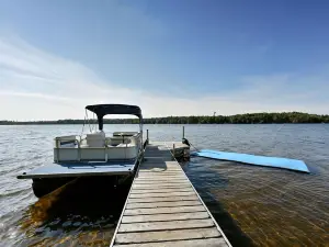 All 4 lakefront condos! Private beach, dock, sauna, club room, decks.