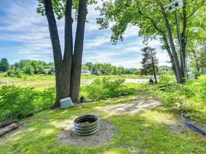 Waterfront Gladwin Home w/ Deck + Fire Pit!