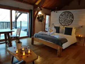 Cabanes du Hérisson, Cabanes perchées de Standing Avec Spa