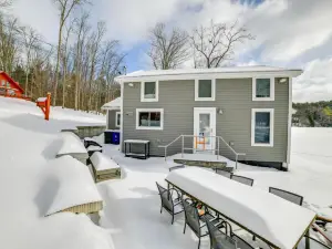 Lakeside Milford Home with Fire Pit and Paddleboat