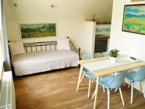 Apartmány u komína