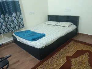 Furnished single room with attached toilet
