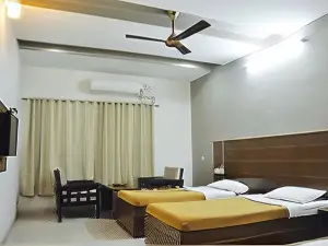 Hotel Sree Vijayalakshmi - (Previously Hotel Dolphin Inn)