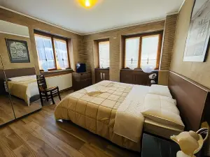 San Luigi Rooms & Apartments