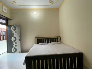Spot on 700636 Samrat Hotel